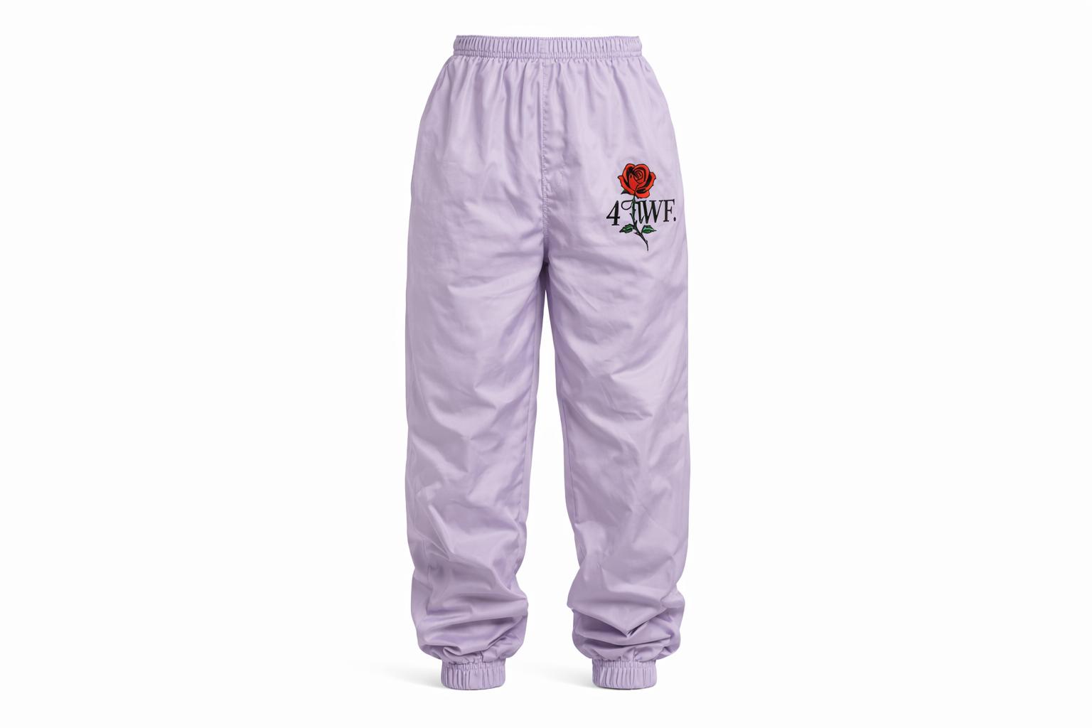 LILAC WINDBREAKER PANTS.